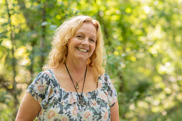 Deborah posed in the sunny outdoors
