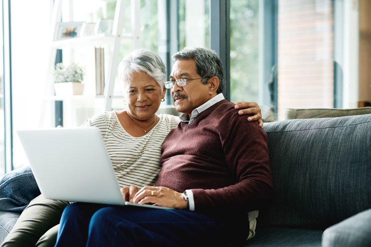 older couple looking at laptop