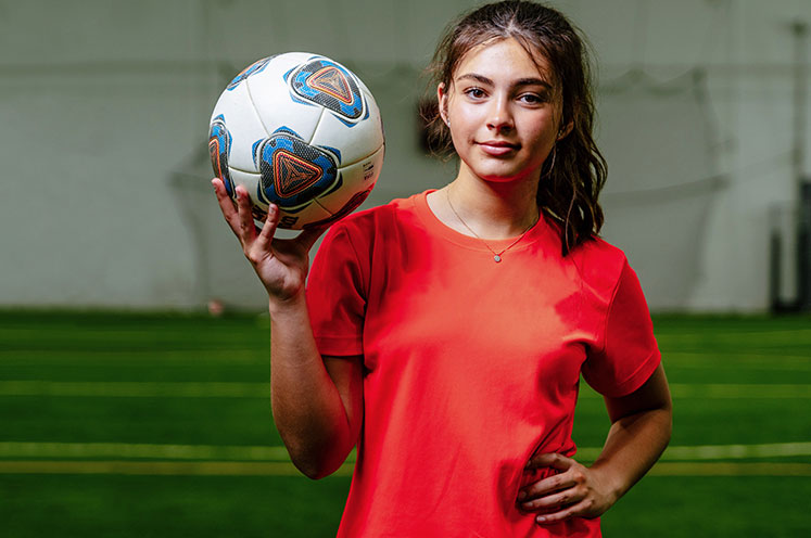 sports patient emiliana with soccer ball