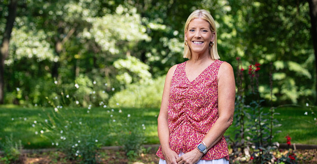 Atrial fibrillation patient Karen posed outdoors