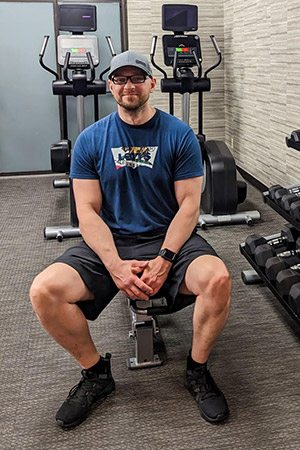 Spine cancer patient at the gym