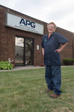Joint Replacement patient Phyllis standing outside her work
