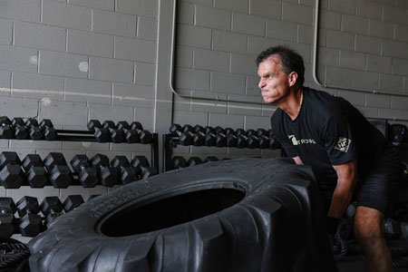 Knee replacement patient thomas rodgers lifting tire