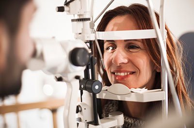 Woman over 40 getting eye exam
