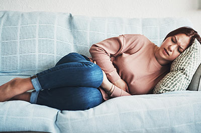woman with stomach pains
