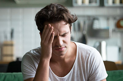 person with headache