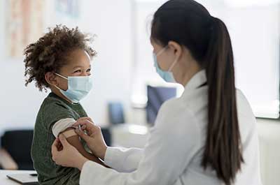 doctor with pediatric patient