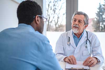 patient talking to doctor