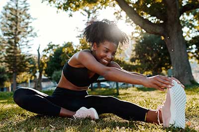 woman stretching outside