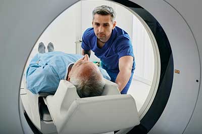 man getting CT scan
