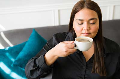 woman drinking coffee