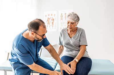 orthopedic doctor with patient