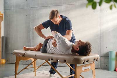 person at chiropractor