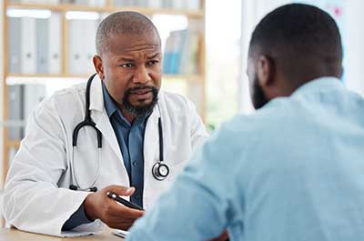 doctor talking to patient