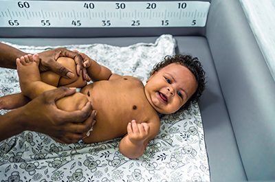 baby on changing table
