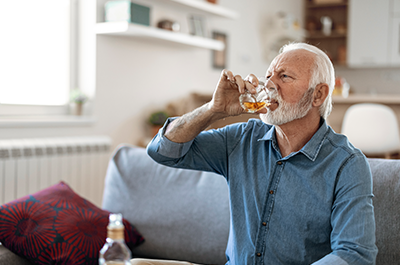 man drinking alcohol