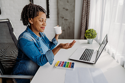 woman taking supplement