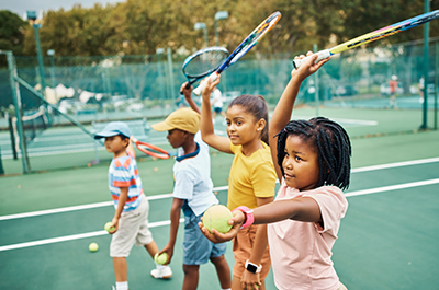 kids playing tennis