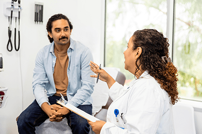 male patient talking to doctor
