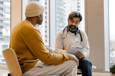 doctor talking to patient