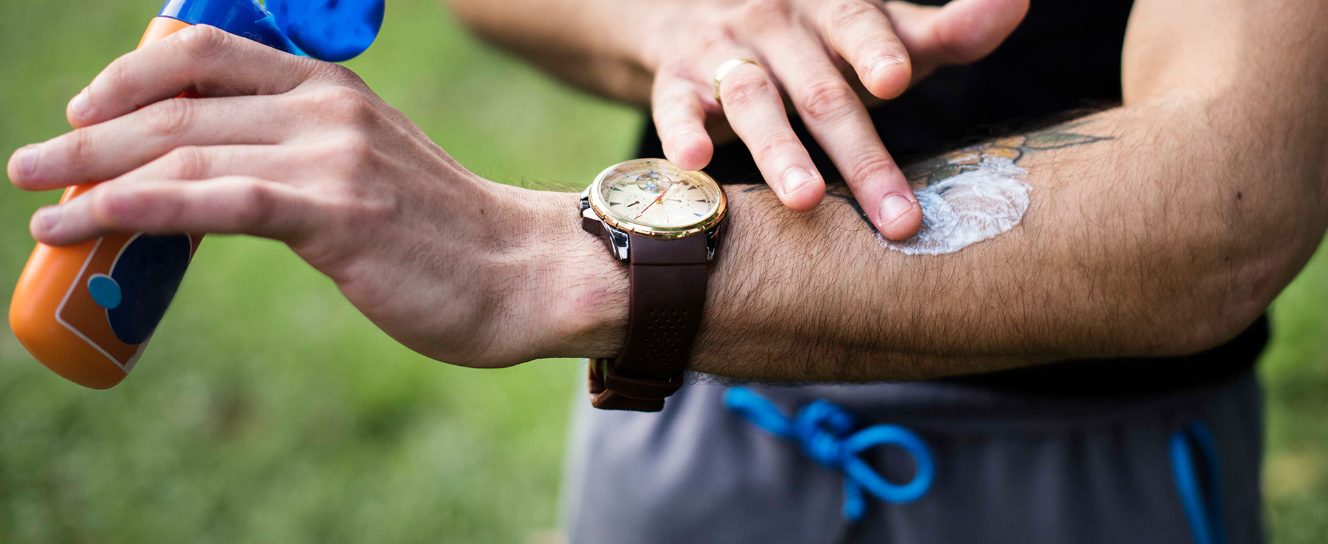 Man using sunscreen