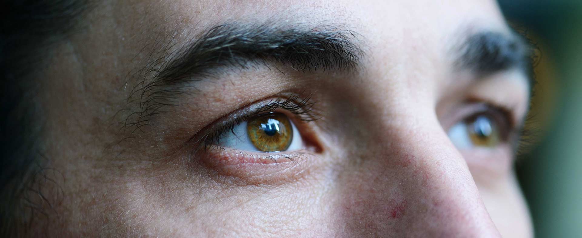 man with eye floaters