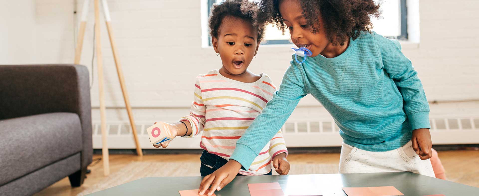 Two young children, playng 