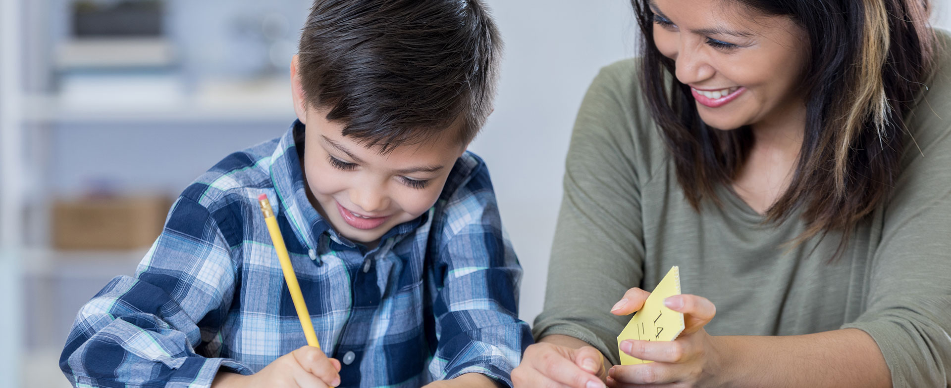 mom helping son with homework
