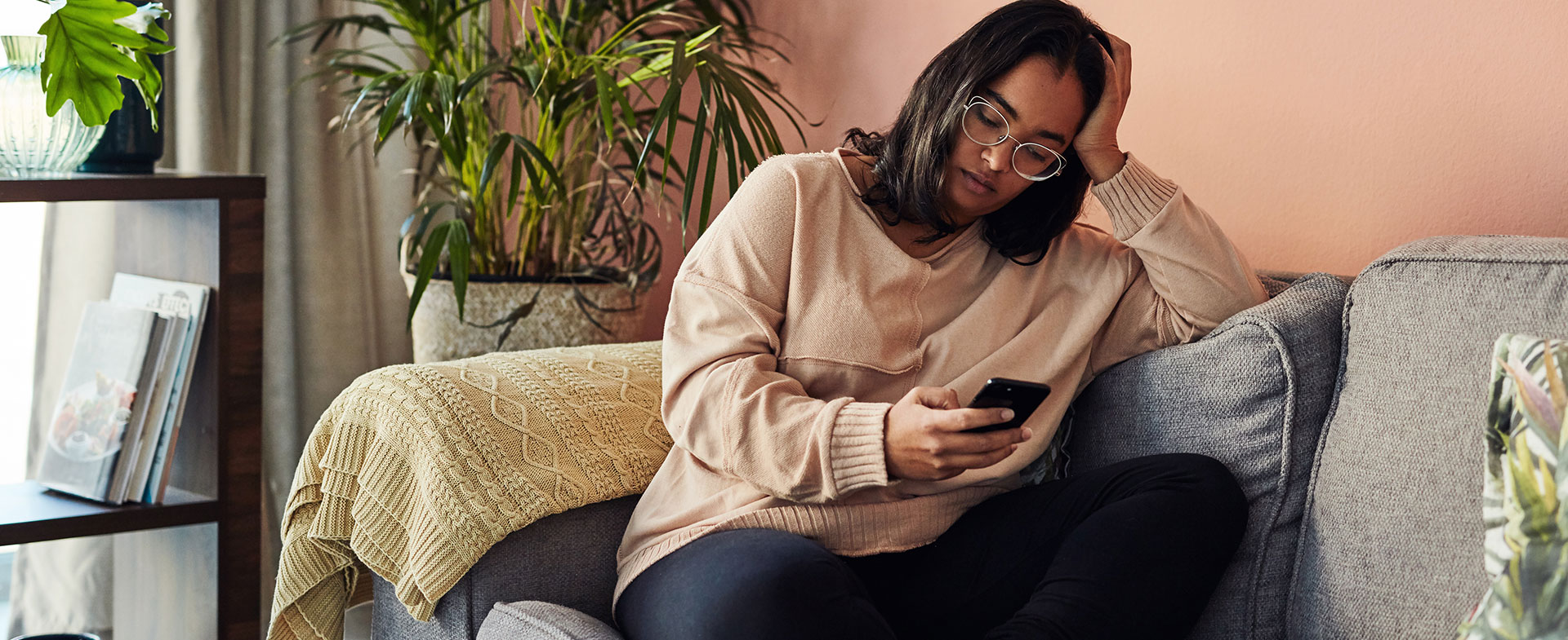 woman scrolling through phone