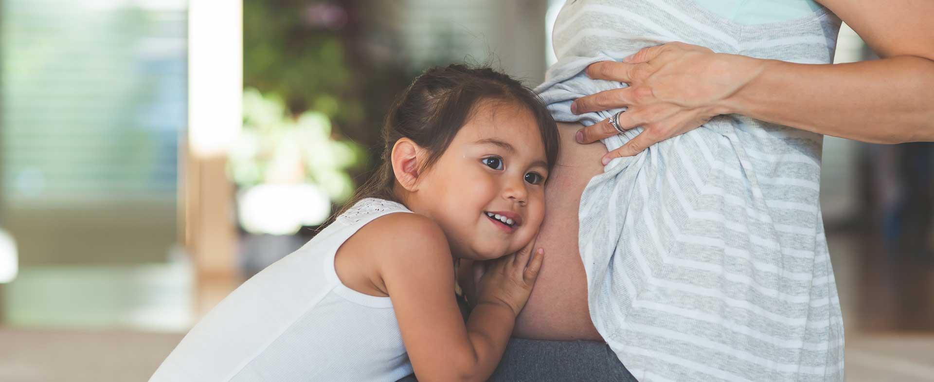 Pregnant mom with child