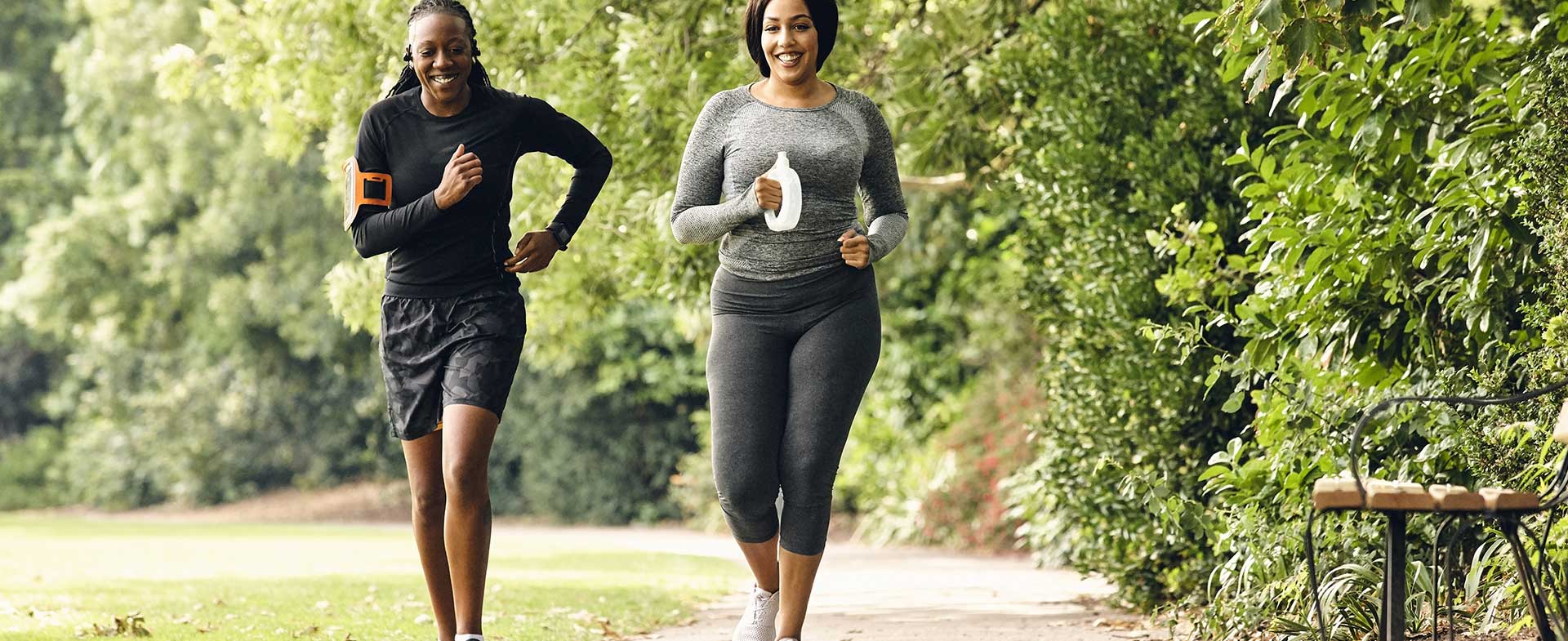 two women running