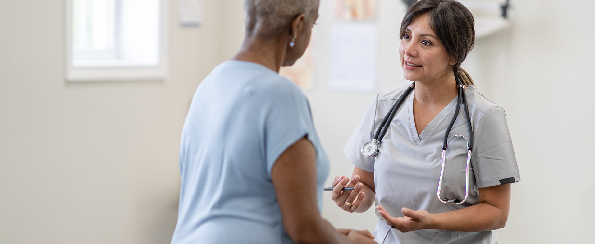 patient talking to doctor