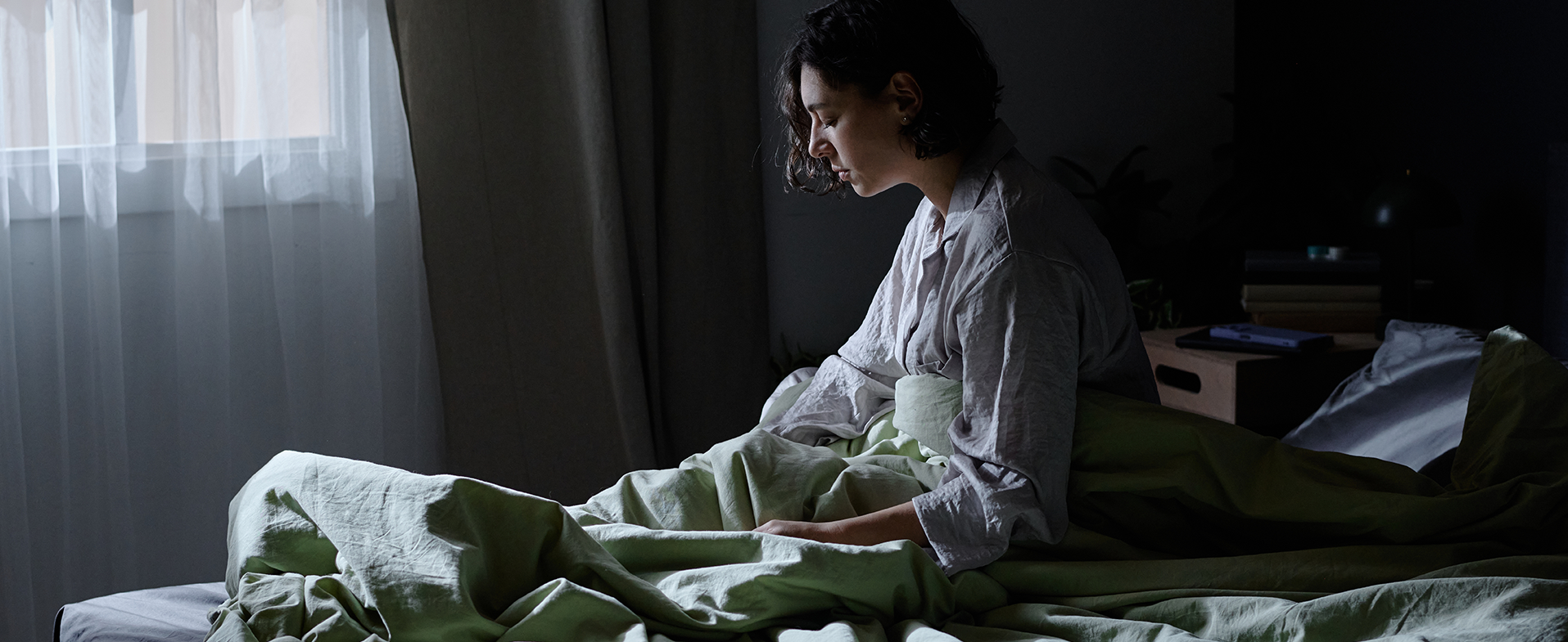 woman awake in bed
