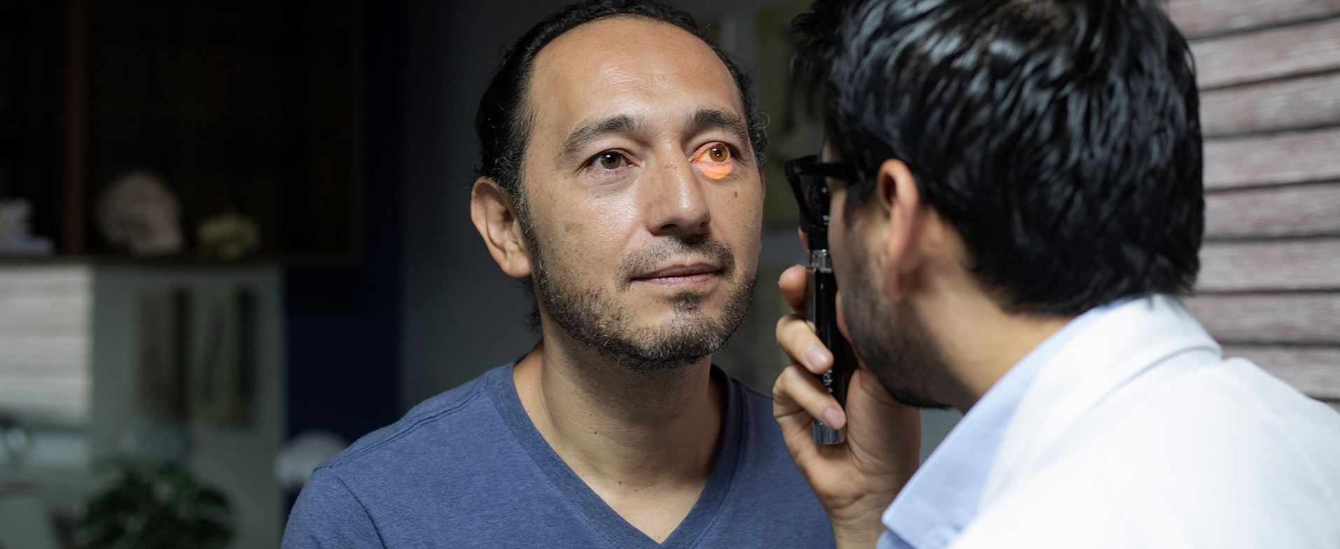 man getting vision checked