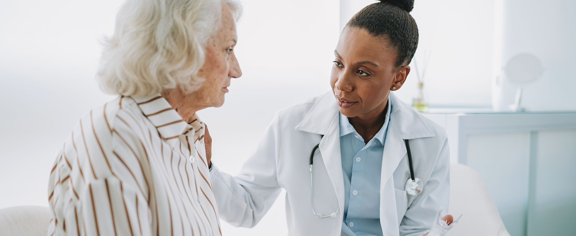 doctor talking to patient