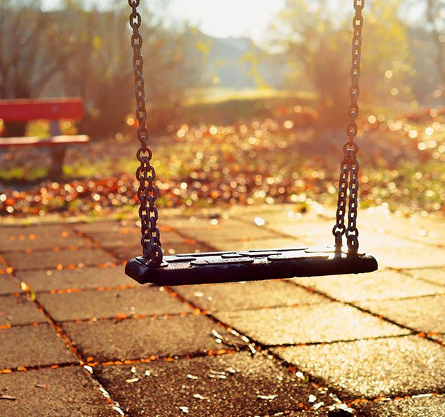 empty playground swing