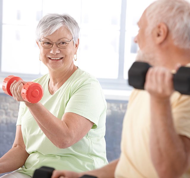 elderly couple working out