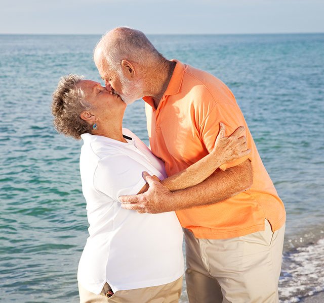 older couple kissing