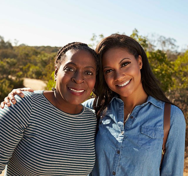 woman outdoors and smiling
