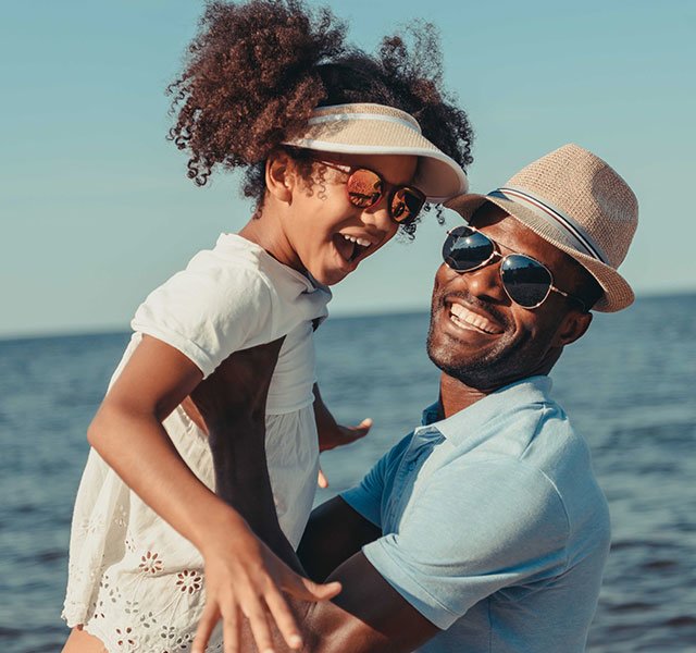 father and daughter wearing sunglasses