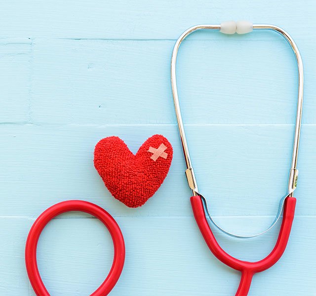 Red stethoscope with heart