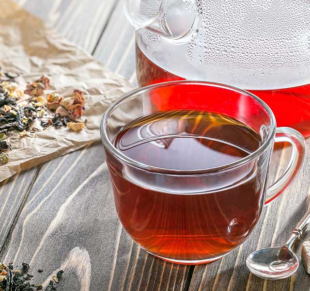 tea cup full with tea