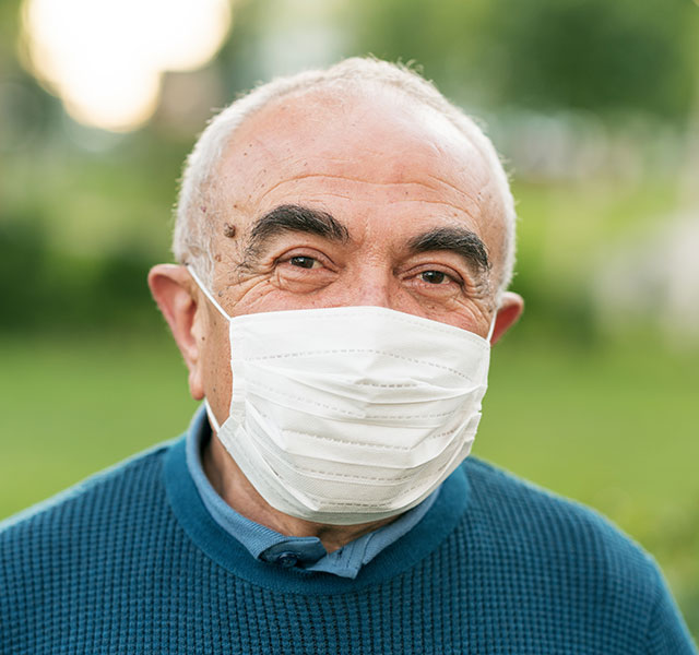 elderly man wearing mask