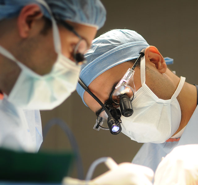 doctors performing surgery