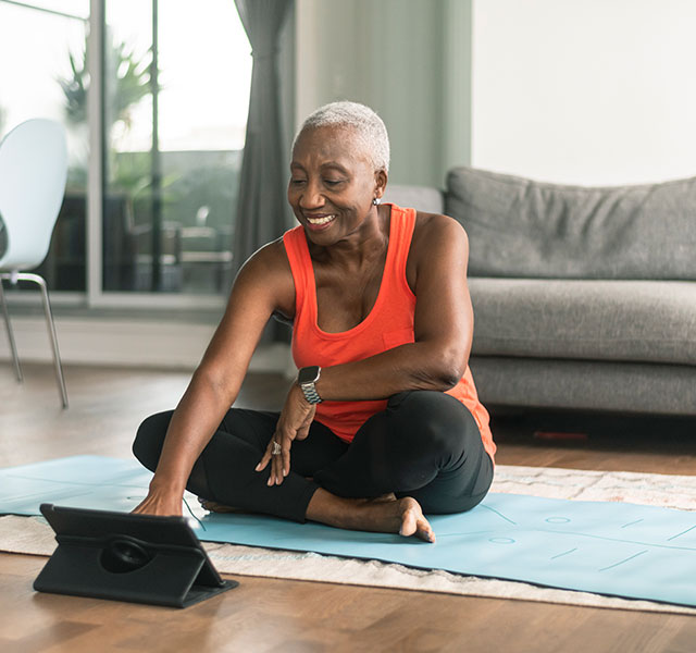 woman exercising at home