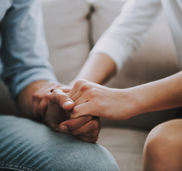 couple holding hands