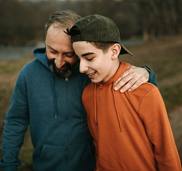 father and son walking
