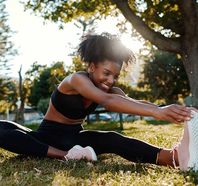 woman stretching outside