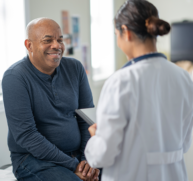 doctor talking to patient