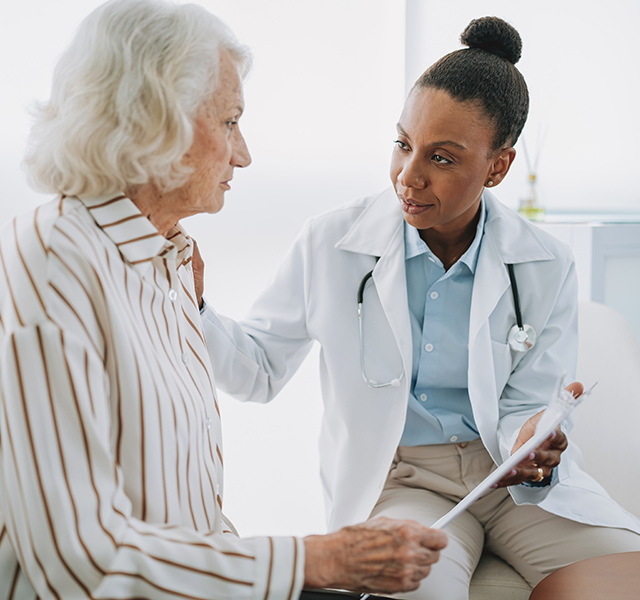doctor talking to patient